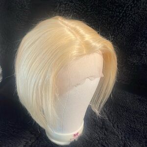 Lace front blonde human hair wig with bleached knots.